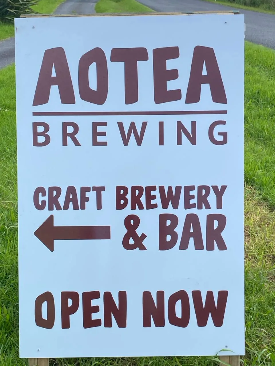 Aotea Brewing Craft Brewery & Bar sign on Mason Road, Medlands Beach, Great Barrier Island